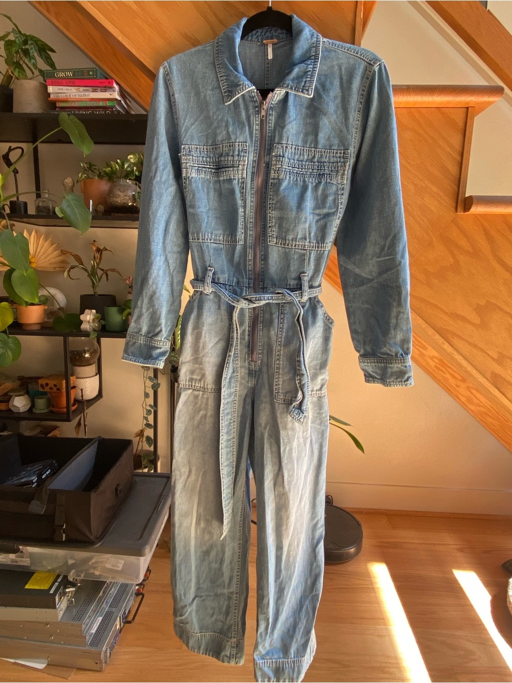 Free People Light Wash Denim Jumpsuit with Tie Waist